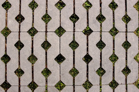 Smooth wall of dark cubes under daylightの写真素材