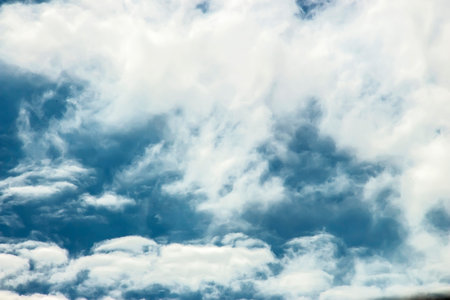 White clouds in the blue sky. Fluffy white clouds
