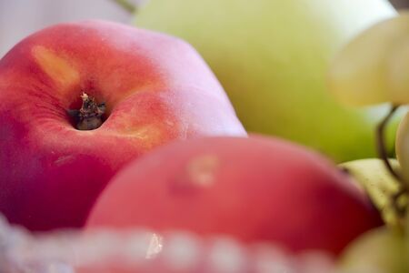 Fresh fruits in a vase on the kitchen tableの写真素材