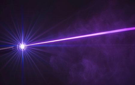 Purple rays of light in the dark with smoke and lens flareの素材
