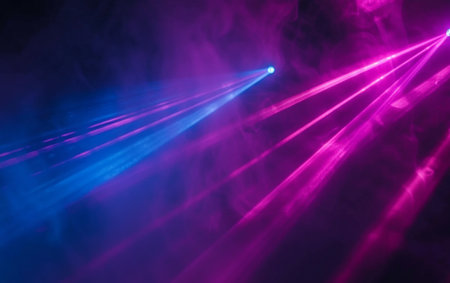stage lighting effect in the dark with violet and pink rays of lightの素材
