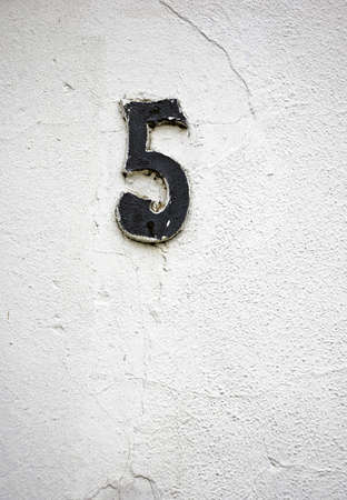 Number 5 on a White Stucco Wallの写真素材