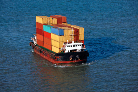 The Small container ship is sailing