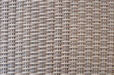 Wicker beige color textured . Braided fabric