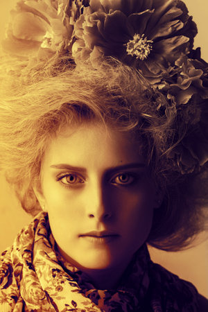 Fashion model with flowers in hairの写真素材