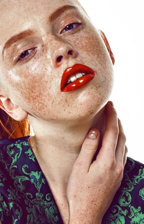 Ginger girl with clean skin. Red lipsの写真素材