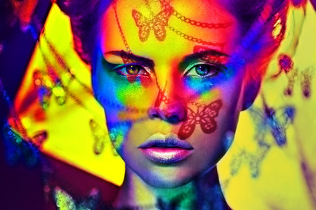 beautiful fashion woman color  face art butterfly shadowの写真素材