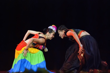 CHENGDU - DEC 10: Duo dance "Taste of Yi village" performed by Beijing Song and Dance Troupe at Golden theater.Dec 10,2007 in Chengdu, China.Choreographer & actor: Wang Ke, Yu Manmanのeditorial素材