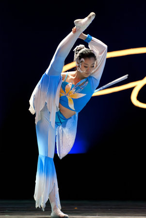 CHENGDU - DEC 9: HAIZHENG art troupe perform group dance Sword Orchid at JINCHENG theater in the 7th...