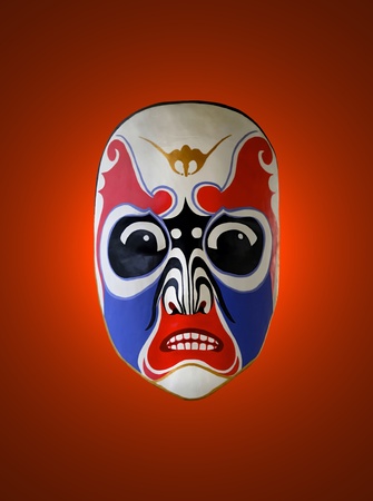 chinese traditional opera facial painting with red isolated backgroundの写真素材