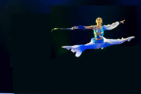 CHENGDU - DEC 10: HAIZHENG art troupe perform chinese group dance Sword Orchid at JINCHENG theater...