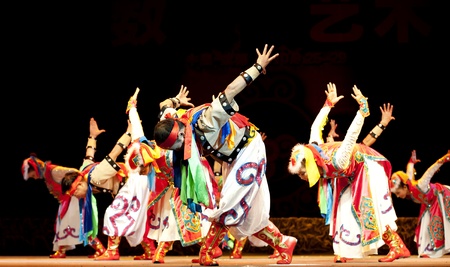 CHENGDU - SEP 28: Mongolian ethnic dance in the 6th Sichuan minority nationality culture festival at JINJIANG theater.Sep 28,2010 in Chengdu, China.のeditorial素材