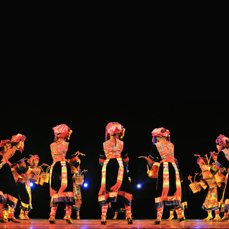 CHENGDU - SEP 28: chinese Qiang ethnic dancers perform on stage at Sichuan experimental theater.Sep 28,2010 in Chengdu, China.のeditorial素材