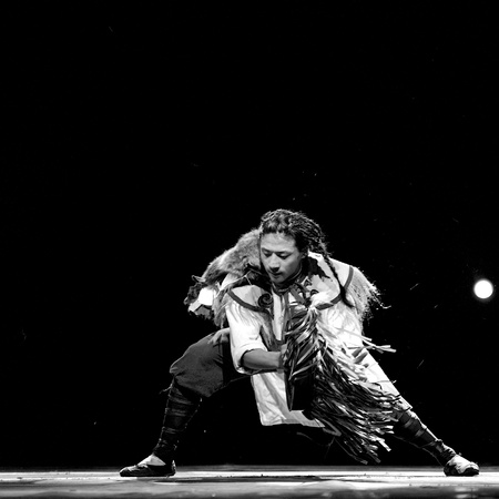 CHENGDU - SEP 28: chinese Qiang ethnic dancer performs on stage at Sichuan experimental theater.Sep 28,2010 in Chengdu, China.のeditorial素材