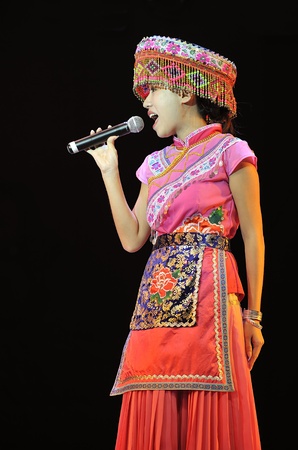 CHENGDU - SEP 28: chinese Miao ethnic singer performs on stage in the 6th Sichuan minority nationality culture festival at JINJIANG theater.Sep 28,2010 in Chengdu, China.
のeditorial素材