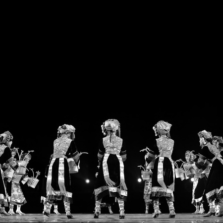 CHENGDU - SEP 28: chinese Qiang ethnic dancers perform on stage at Sichuan experimental theater.Sep 28,2010 in Chengdu, China.のeditorial素材