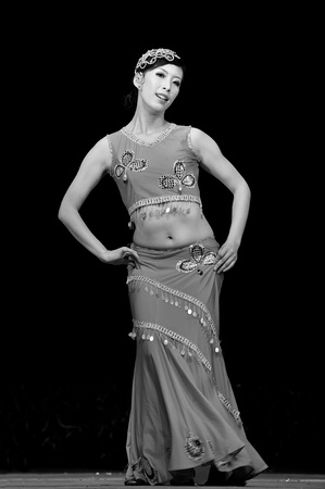 CHENGDU - SEP 28: chinese Dai ethnic dancer performs on stage in the 6th Sichuan minority nationality culture festival at JINJIANG theater.Sep 28,2010 in Chengdu, China.のeditorial素材