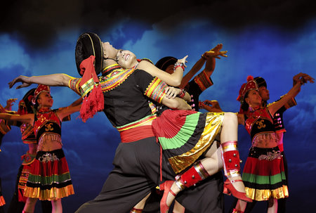 CHENGDU - SEP 26: chinese ethnic dancers of Yi nationality perform on stage at JIAOZI theater.Sep...