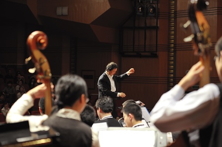 CHENGDU - APR 23: student symphonic band perform on stage on Apr 24,2011 in Chengdu,China.のeditorial素材