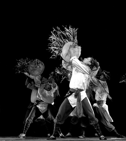 CHENGDU - SEP 28: chinese Qiang ethnic dancers perform on stage at Sichuan experimental theater.Sep 28,2010 in Chengdu, China.のeditorial素材