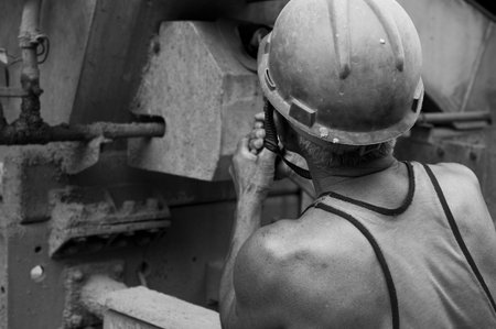 hardworking laborer on construction siteの写真素材