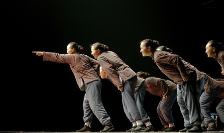 CHENGDU - DEC 13: Chinese dancers perform modern dance onstage at JINCHENG theater in the 7th national dance competition of china on Dec 13,2007 in Chengdu, China.のeditorial素材