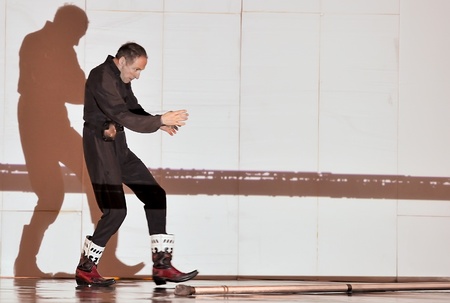 CHENGDU - APR 20: French modern dancer performs Dance contemporary on stage at at JINSHA theater on Apr 20, 2011 in Chengdu, China.The dancer is the famous France modern hoofer Dominique Boivin.のeditorial素材