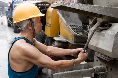 hardworking laborer on construction siteの写真素材