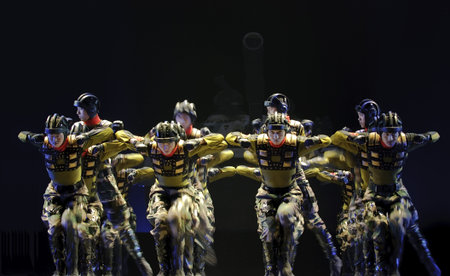 CHENGDU - DEC 12: chinese dancers perform modern group dance on stage at JINCHENG theater in the 7th national dance competition of china on Dec 12,2007 in Chengdu, China.のeditorial素材