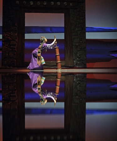 CHENGDU - MAY 25: Chinese Modern Dance Drama Red Army's flower perform on stage at Xinan theater on May 25, 2011 in Chengdu, China.のeditorial素材