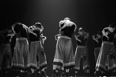 CHENGDU - DEC 10: chinese ethnic dancers perform folk group dance on stage at JINCHENG theater in the 7th national dance competition of china on Dec 10,2007 in Chengdu, China.のeditorial素材