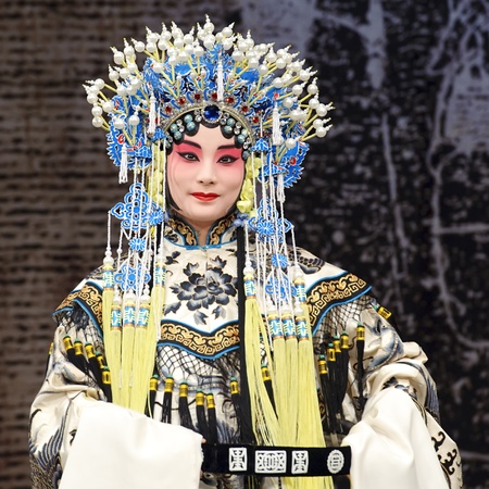 CHENGDU - MAY 30: chinese Beijing opera performer make a show on stage to compete for awards at Shengge theater in 25th Chinese Drama Plum Blossom Award competition.May 30, 2011 in Chengdu, China.Chinese Drama Plum Blossom Award is the highest theatricalのeditorial素材