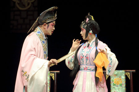 CHENGDU - MAY 28: chinese Sichuan opera performer make a show on stage to compete for awards at Jinsha theater in 25th Chinese Drama Plum Blossom Award competition.May 28, 2011 in Chengdu, China.Chinese Drama Plum Blossom Award is the highest theatrical のeditorial素材