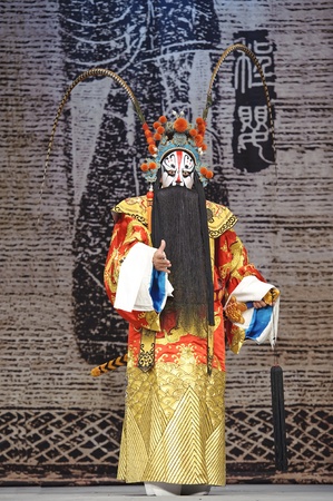 CHENGDU - MAY 30: chinese Beijing opera performer make a show on stage to compete for awards at Shengge theater in 25th Chinese Drama Plum Blossom Award competition.May 30, 2011 in Chengdu, China.
Chinese Drama Plum Blossom Award is the highest theatricalのeditorial素材