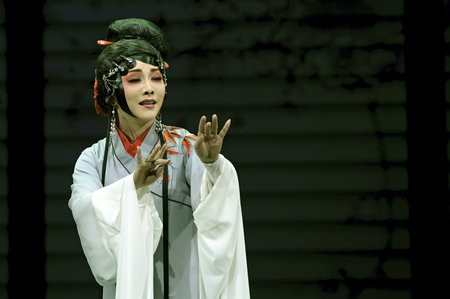 CHENGDU - JUN 4: chinese Sichuan opera performer make a show on stage to compete for awards in 25th...