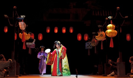 CHENGDU - JUN 4: chinese Sichuan opera performer make a show on stage to compete for awards in 25th Chinese Drama Plum Blossom Award competition at Xinan theater.Jun 4, 2011 in Chengdu, China.Chinese Drama Plum Blossom Award is the highest theatrical awaのeditorial素材