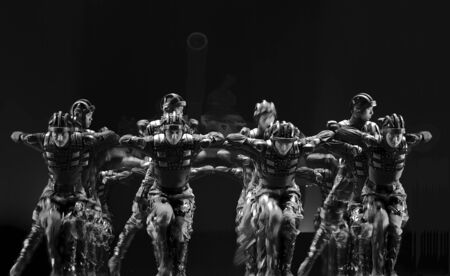 CHENGDU - DEC 12: chinese dancers perform modern group dance on stage at JINCHENG theater in the 7th national dance competition of china on Dec 12,2007 in Chengdu, China.のeditorial素材