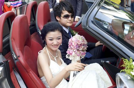 a young couple on their wedding dayの写真素材
