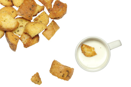 closeup of delicious bread croutons and milk