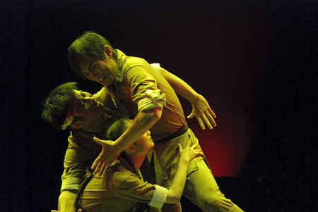 CHENGDU - DEC 10: Modern dancers perform on stage at JINCHENG theater in the 7th national dance...