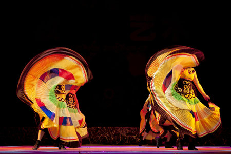 CHENGDU - SEP 28: chinese Yi ethnic dancers perform on stage in the 6th Sichuan minority nationality...