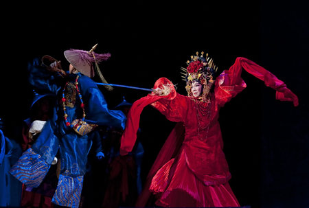 CHENGDU - JUN 3: chinese Cantonese opera performer make a show on stage to compete for awards in 25th Chinese Drama Plum Blossom Award competition at Jinsha theater.Jun 3, 2011 in Chengdu, China.Chinese Drama Plum Blossom Award is the highest theatrical のeditorial素材