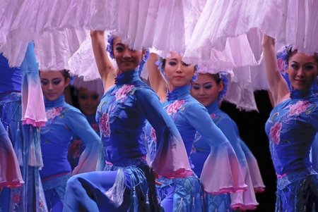 CHENGDU - DEC 13: Chinese modern dancers perform group dance on stage at JINCHENG theater in the 7th national dance competition of china on Dec 13,2007 in Chengdu, China.のeditorial素材