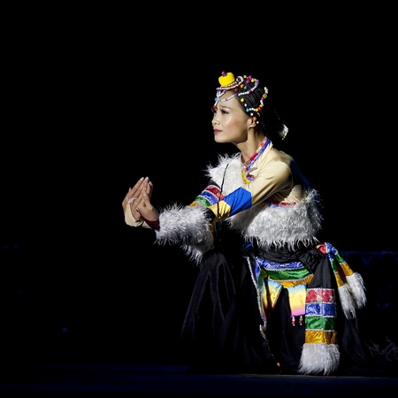 CHENGDU - SEP 28: chinese Tibetan ethnic dancer performs on stage in the 6th Sichuan minority nationality culture festival at JINJIANG theater.Sep 28,2010 in Chengdu, China.のeditorial素材
