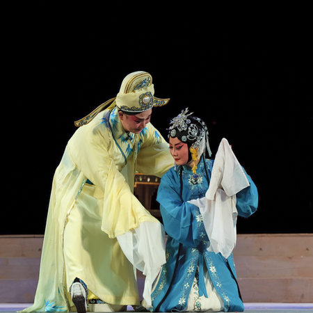 CHENGDU - JUN 6: Mulian Drama of Chinese Qi opera performer make a show on stage to compete for...