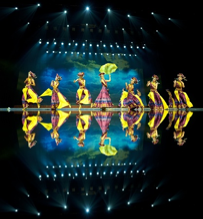 CHENGDU - SEP 26: chinese Yi ethnic dancers perform on stage at JIAOZI theater.Sep 26,2010 in Chengdu, China.のeditorial素材