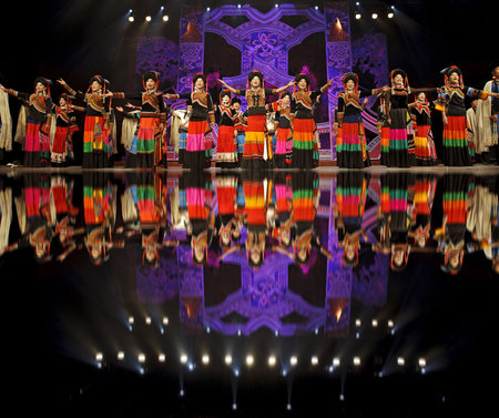 CHENGDU - SEP 26: chinese Yi ethnic dancers perform on stage at JIAOZI theater.Sep 26,2010 in...
