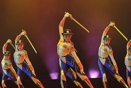 CHENGDU - DEC 11: chinese modern dancers perform group dance on stage at JINCHENG theater in the 7th...