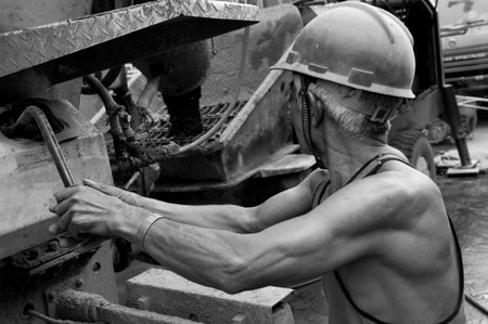 hardworking laborer on construction siteの写真素材