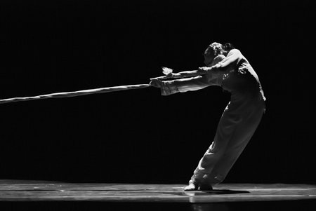 CHENGDU - DEC 9: Modern dancer performs on stage at JINCHENG theater in the 7th national dance...